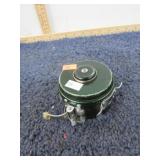 AUTOMATIC FLY FISHING REEL