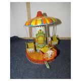 TIN TOY MERRY GO ROUND