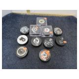 AUTOGRAPHED HOCKEY PUCKS