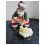 CLOTHTIQUES WORKING AT THE DOG WASH SANTA FIGURE