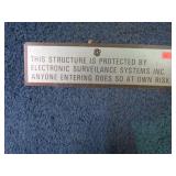 ENTER AT  OWN RISK PLAQUE