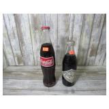 1975 & FOREIGN UNOPENED COCA COLA BOTTLES