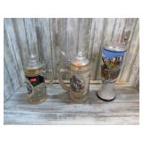 2 GERMAND AND 1 BUDWEISER BEER STEINS