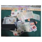 ASSORTED POSTAGE STAMPS W/ POST MARKS