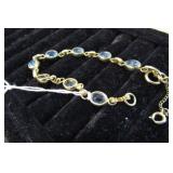 7 1/2" STERLING SILVER BRACELET W/ BLUE STONES