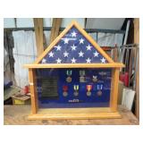 MILITARY MEDAL AND US FLAG DISPLAY
