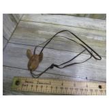 CARVED ANIMAL HEAD BOLO TIE