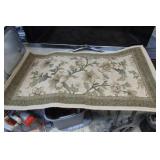32" X 47" RUG -- HAS DOG HAIR