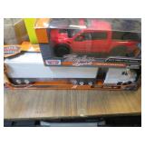 DIECAST HAULER & FORD RAPTOR TRUCKS