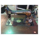 ANTIQUE SINGER TREDDLE SEWING MACHINE --ORNATE
