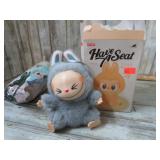 POP MART GAVE A SEAT HE HE DOLL