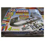 "H O" SUPER INTERNATIONAL SLOT CAR SET