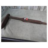 IRON ITEM -- POSSIBLY A GRINDING WHEEL SPINDLE