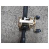 BOAT FISHING ROD W/ PENN 320 REEL