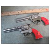 PAIR-- GENE AUTRY CAST IRON CAP PISTOLS