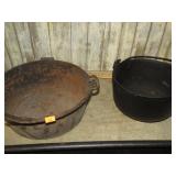 2-- CAST IRON HANGING POTS