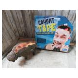 BUFFALO FIGURINE & TAPE ON FACE GAME