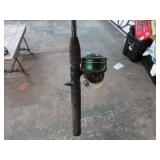 JOHNSON FISHING REEL ON EAGLE CLAW ROD