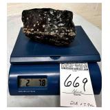 Appears to be a Snowflake Obsidian Crystal.