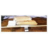 Lot of cylindrical wooden connecting rods