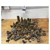 Numerous brass pipe fittings
