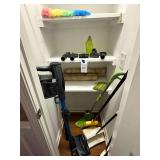 Closet Content - Shark Vacuum with attachments, extra wall paper, Dusting & Cleaning Supplies