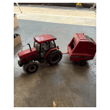 Case International 5250 Tractor Paired with a Case IH 8465 Round Baler