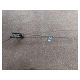 Lot of Two Fishing Rods with Reels: Johnson TangleFree 10 and Bass Pro Shops Megacast Tournament Series