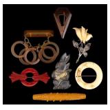 Bakelite, Sterling, and Lucite Brooches