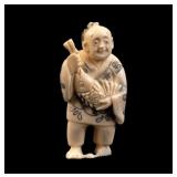 19th C Japanese Netsuke of Man w/ Fish