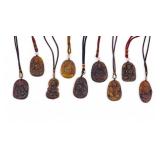 Guanyin Embossed Brown Hardstone Pendants (9)