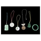 Carved Nephrite and Green Hardstone Medallions