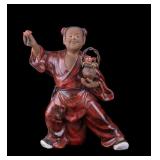 Early Wucai Mudman Statuette