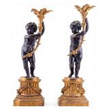 Pair of Bronze Figural Candlesticks