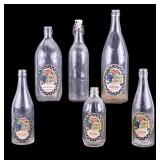Bottles with ASCO Grape Juice Labels