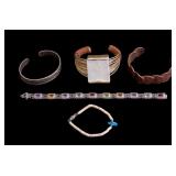 4 Bracelets one by Robert Lee Morris