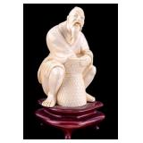 Chinese Carved Figure of Elderly Salesman
