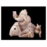 Antique Carved Figure of Man Riding Fish