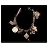 14k Gold Charm Bracelet  w/ 9 Charms