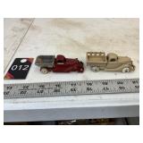 2 Hubley cast iron dump trucks