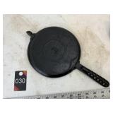 1/2 of a Lodge waffle iron