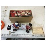 Metal wind up w/ box and COA