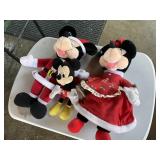 Christmas Mickey and Minnie Mouse plus an extra