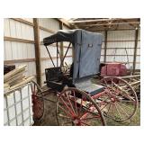 Black Drï¿½s buggy with red undercarriage