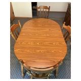 Kitchen table and (4)  chairs w/one leaf