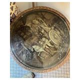 Decorative round end table. Oriental design