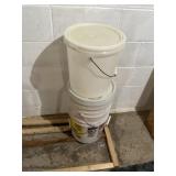 Stack of buckets some lids