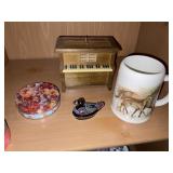 Coasters and mug with a tiny duck