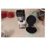 Mini waffles one hitter, and an aerosol sprayer
