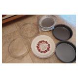 Several pie pans Pyrex, and others
